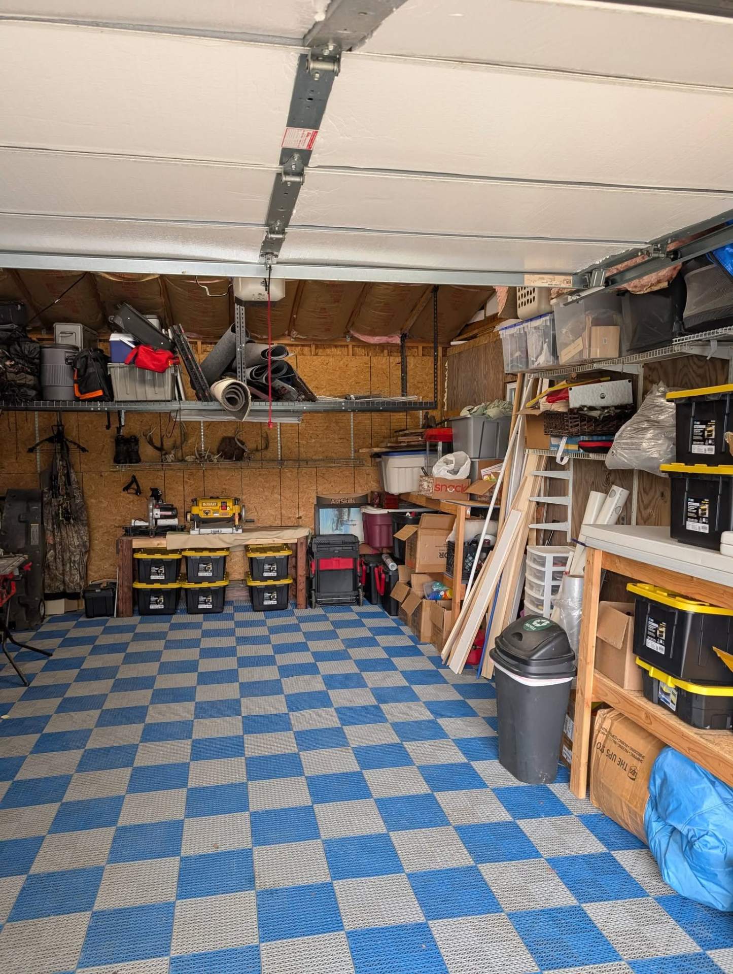 Blue tile floor garage before and after - after